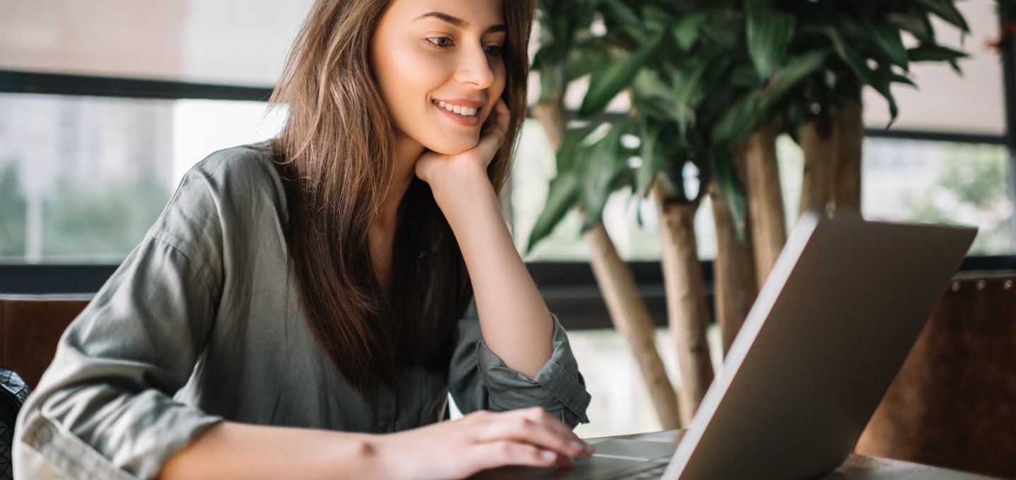 a woman viewing her laptop