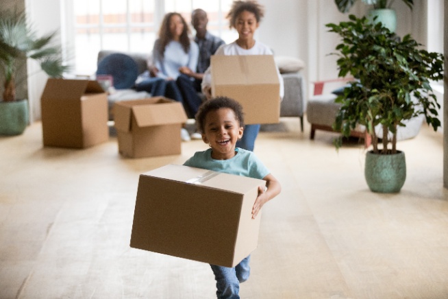 a family having fun in their new home.