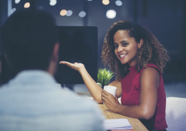 two people discussing a business agenda