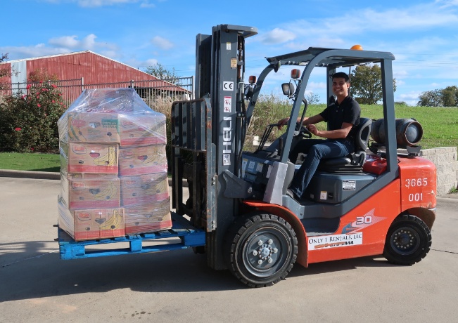 person driving a fork lift